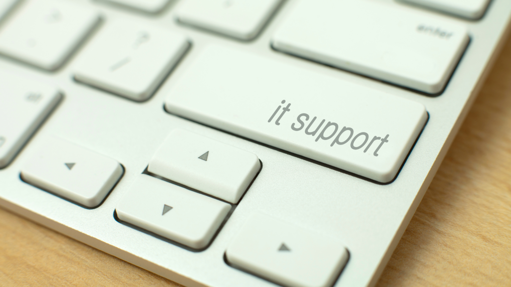 Computer keyboard with a button saying IT Support